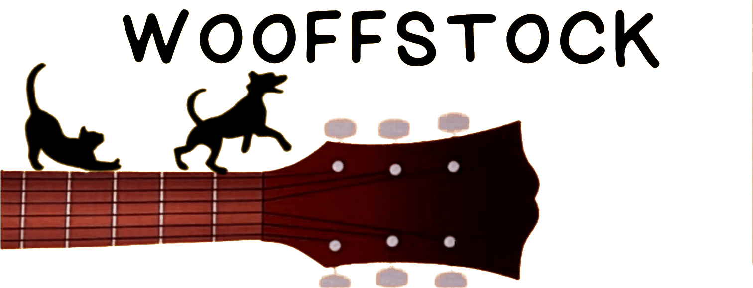 Wooffstock — a cat and dog playing on the neck of a guitar